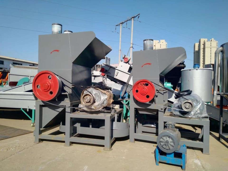 Modern plastic shredder machine in Philippine recycling facility showing industrial equipment processing plastic waste
