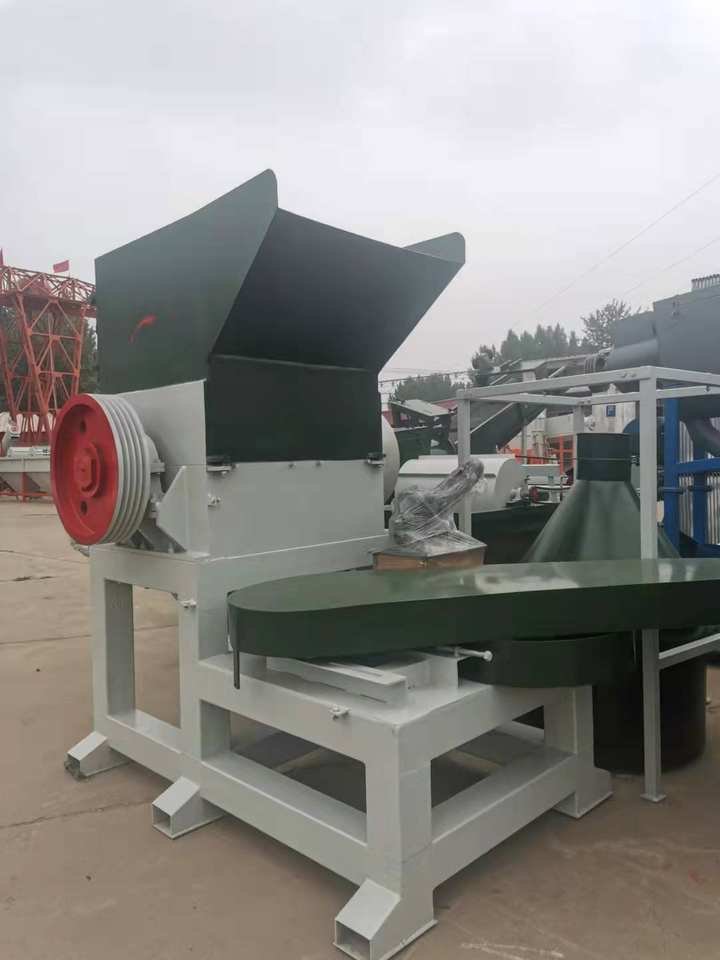 Industrial plastic shredder processing agricultural waste in Philippine banana plantation