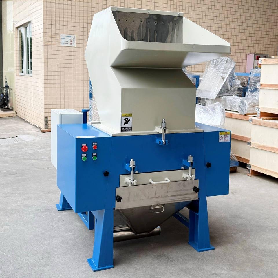 Industrial plastic shredder processing agricultural waste in Philippine banana plantation