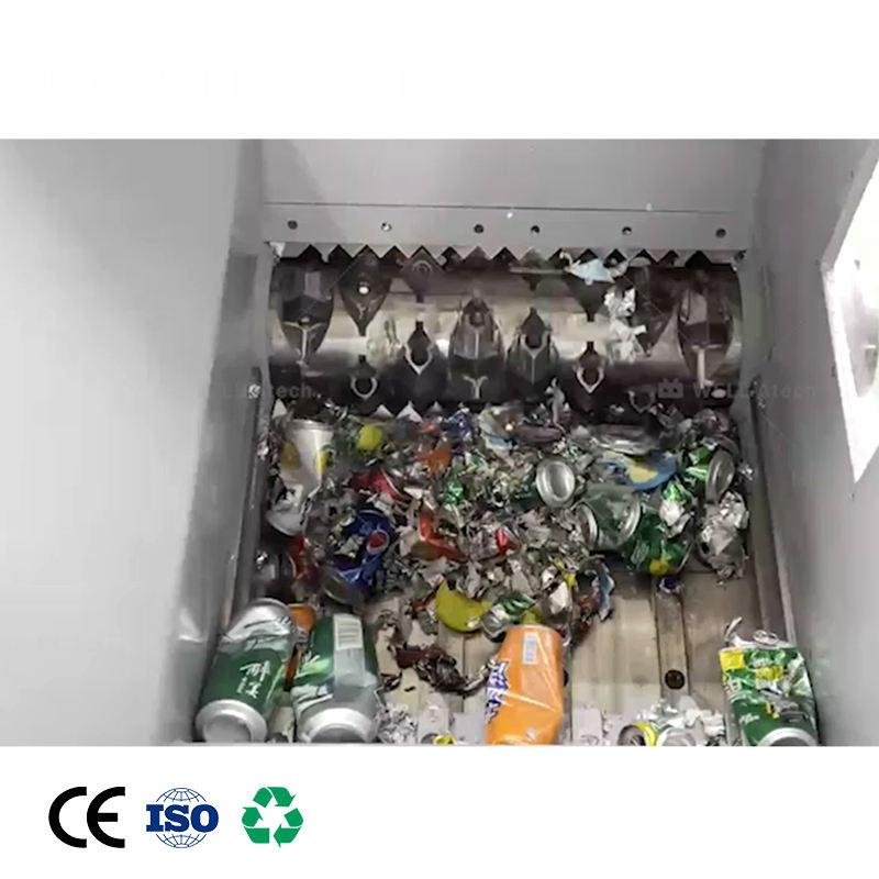 Industrial plastic shredder processing rigid plastic parts