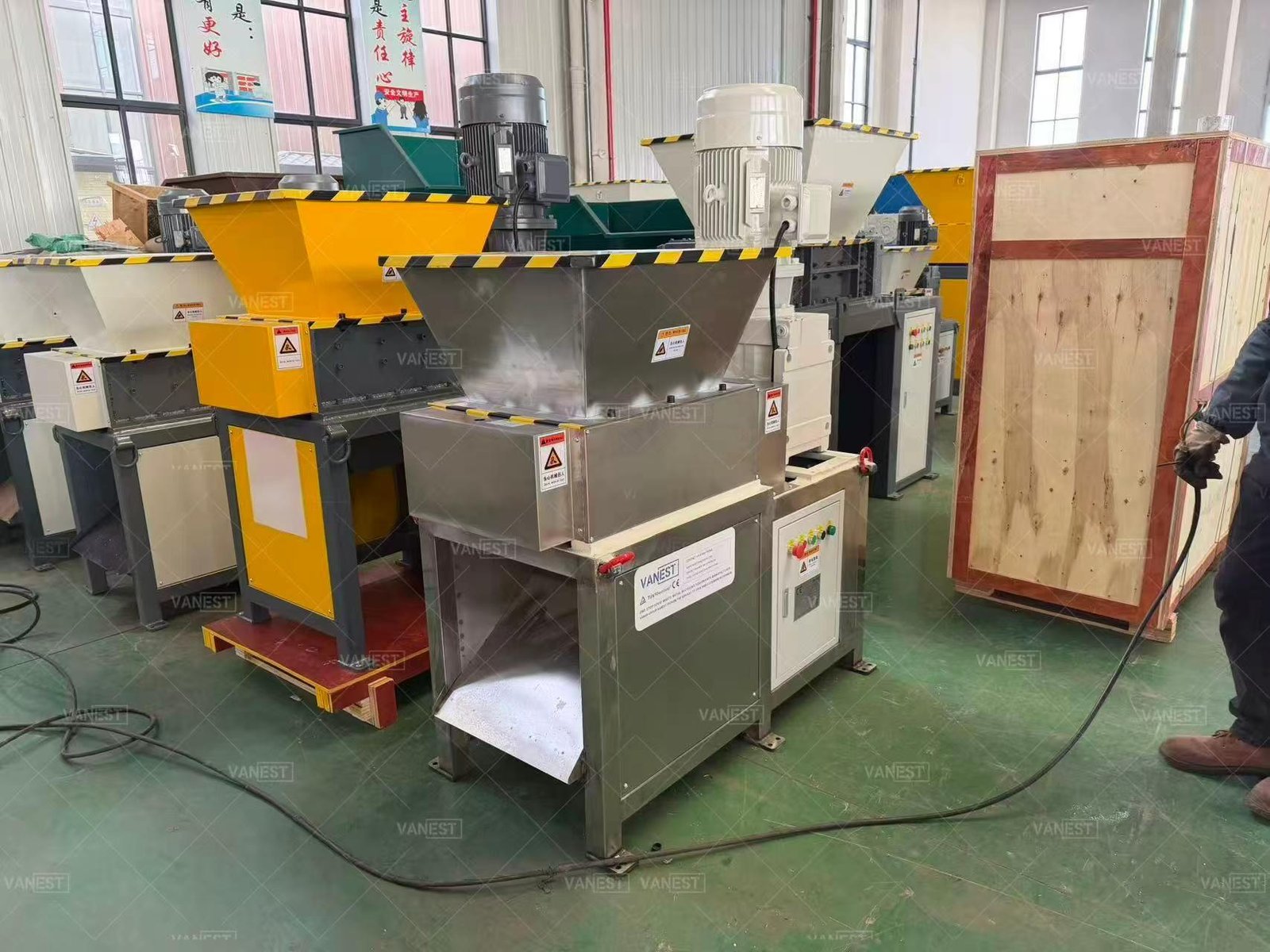 Modern plastic shredder machine in Philippine recycling facility showing industrial equipment processing plastic waste