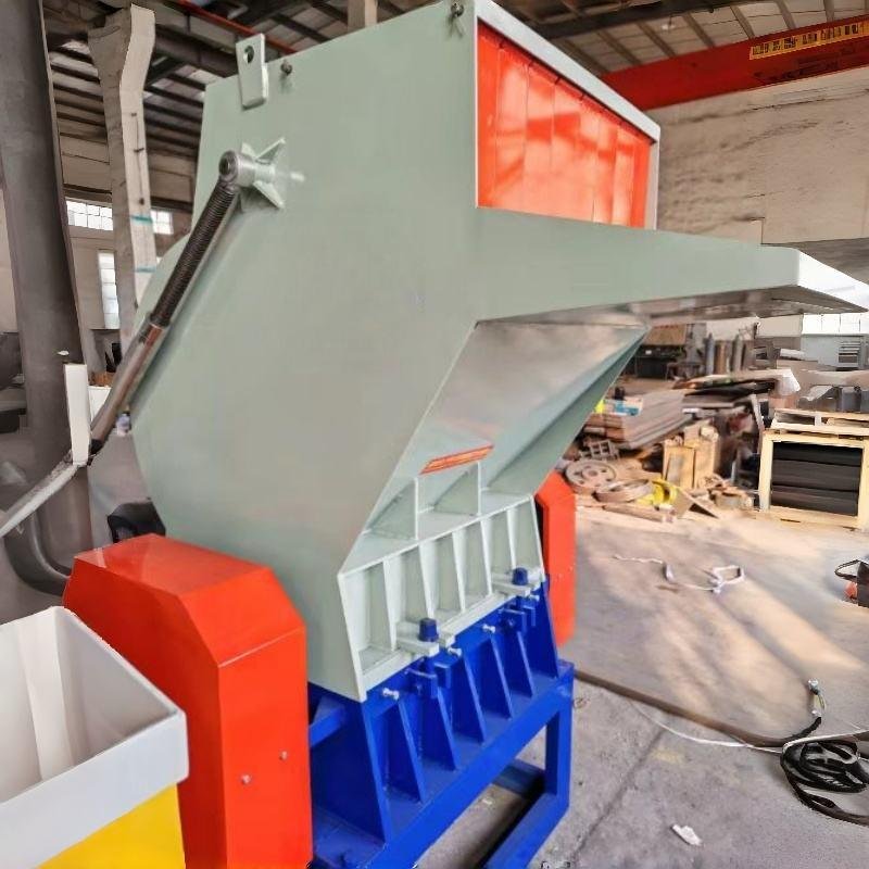 Modern plastic shredder machine in Philippine recycling facility showing industrial equipment processing plastic waste