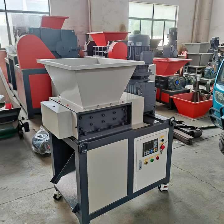 Modern plastic shredder machine in Philippine recycling facility showing industrial equipment processing plastic waste