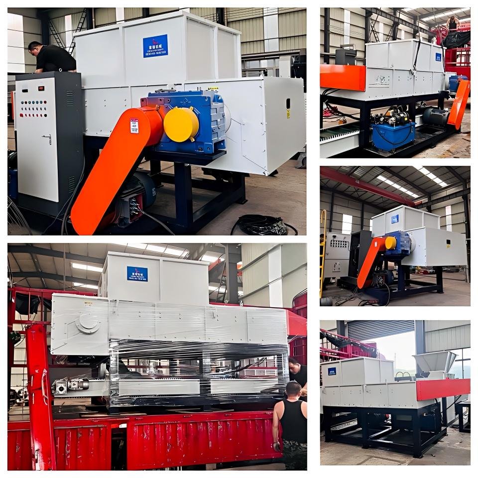 Industrial plastic shredder machine processing e-waste materials in recycling facility